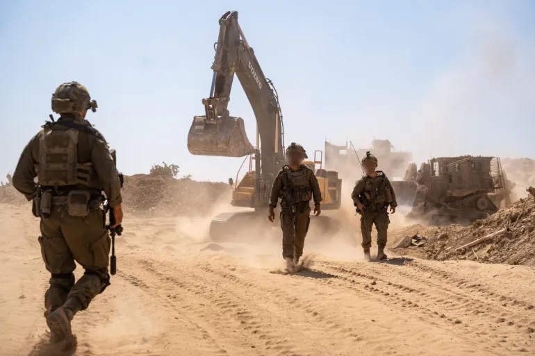 حماس تطالب بإدراج تجريف جثامين الفلسطينيين بغزة لجرائم إسرائيل